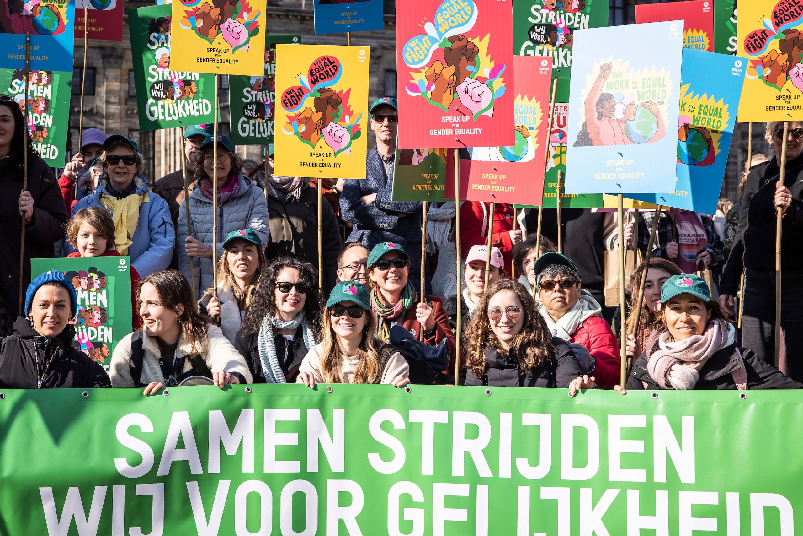 Group of protesters holding banners